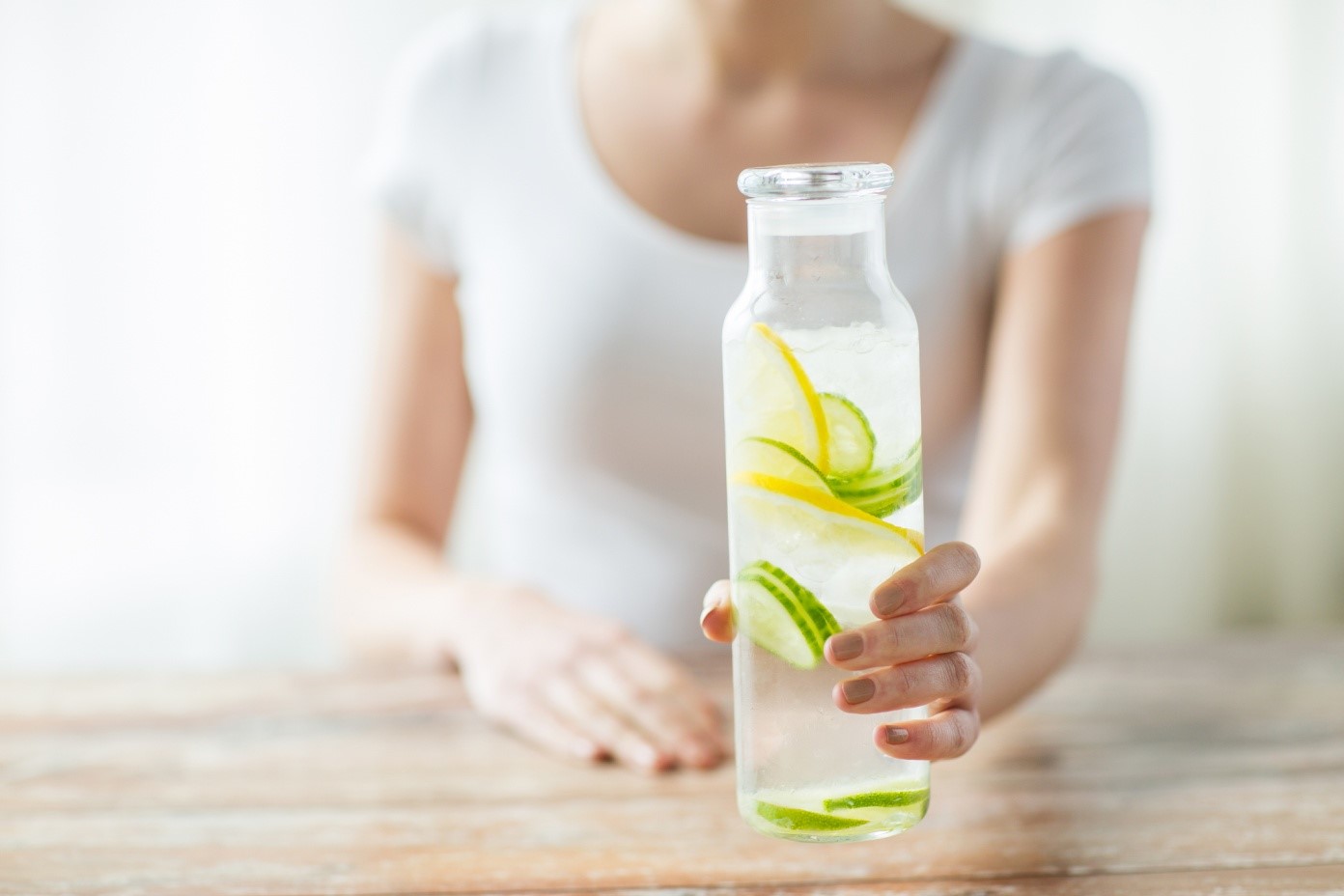 Image result for woman drinking lemon water