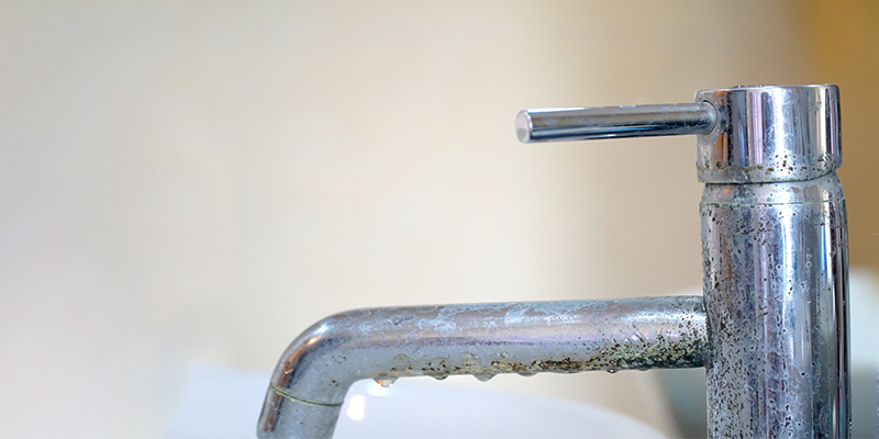 Effects of hard water on bathroom sink and faucet