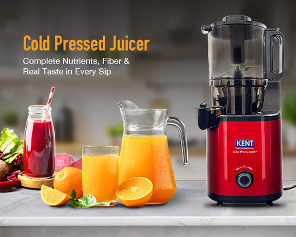 Kent Cold Pressed Juicer from Kent RO Systems shown with stainless steel components and juicing chamber in a clean kitchen setting.