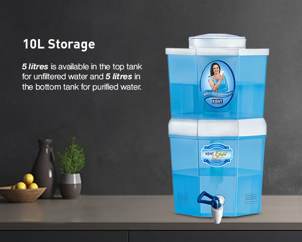 Kent Gold Optima gravity water purifier with transparent plastic housing and spout for clean drinking water.