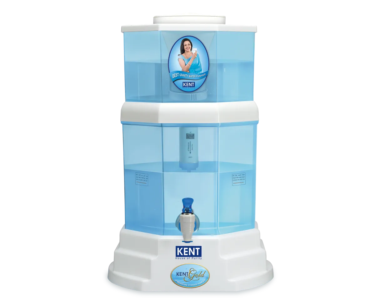 Kent Gold gravity water purifier with transparent container and gold-colored lid, showcasing its compact design and filtration system.