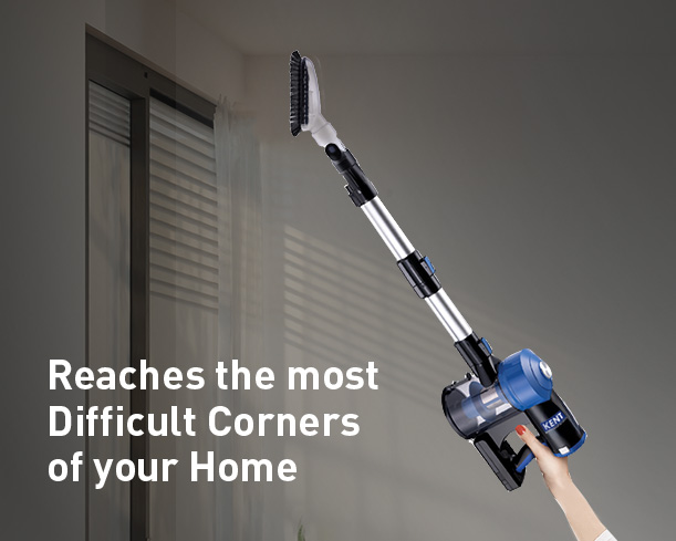 Kent Zoom Plus vacuum cleaner with upright design, featuring a red and black body and a flexible hose for efficient cleaning.